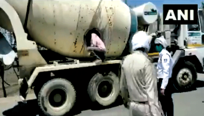 labour caught from inside a cement mixer trying to flee lucknow