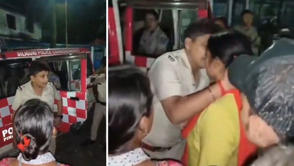 on duty, police officer, kissed a woman, drunk, Siliguri, accusation