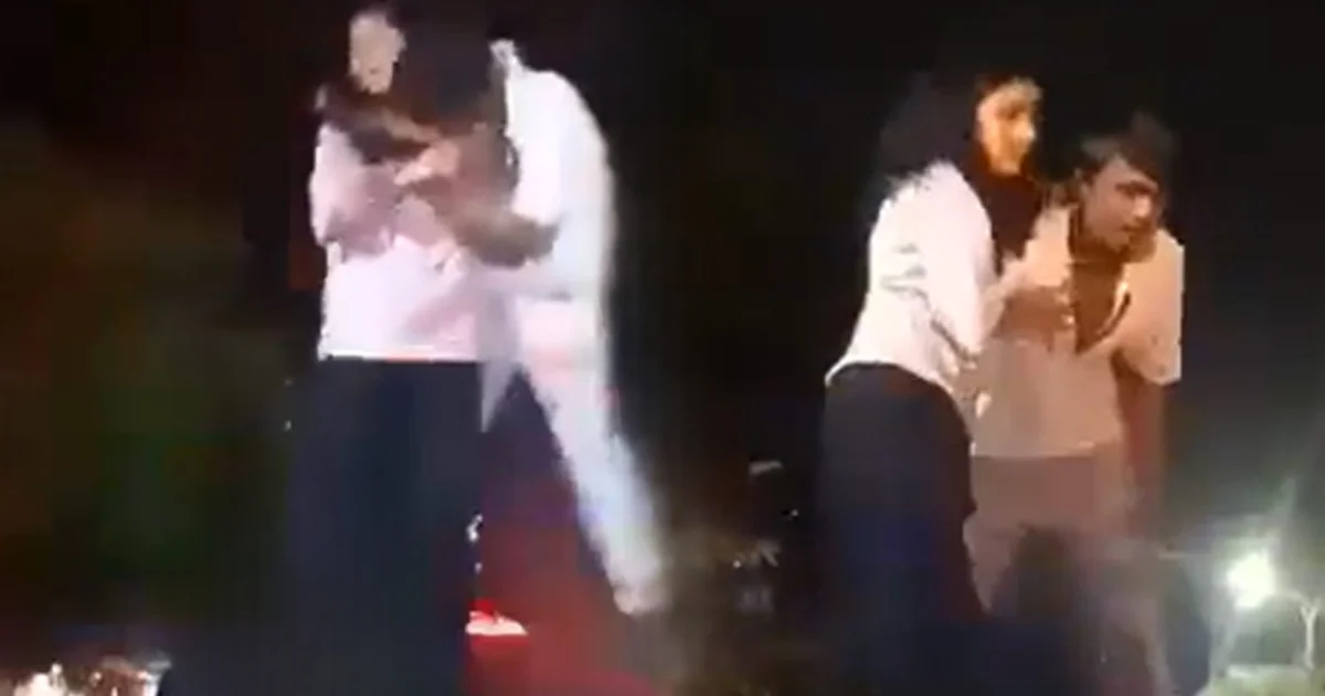 couple dancing kissing on police car in kota